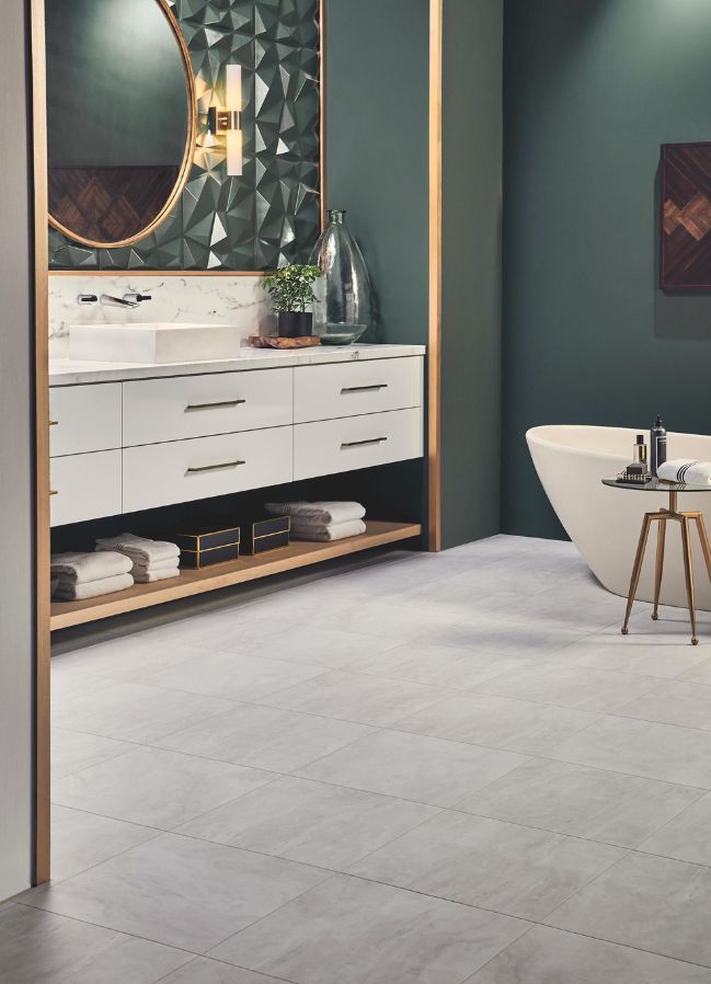 grey luxury vinyl tile flooring in a elegant bathroom with green walls 